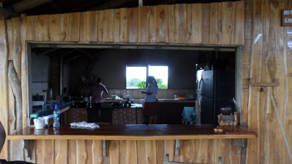 The owners, making the best bean & cheese expands I'll ever have